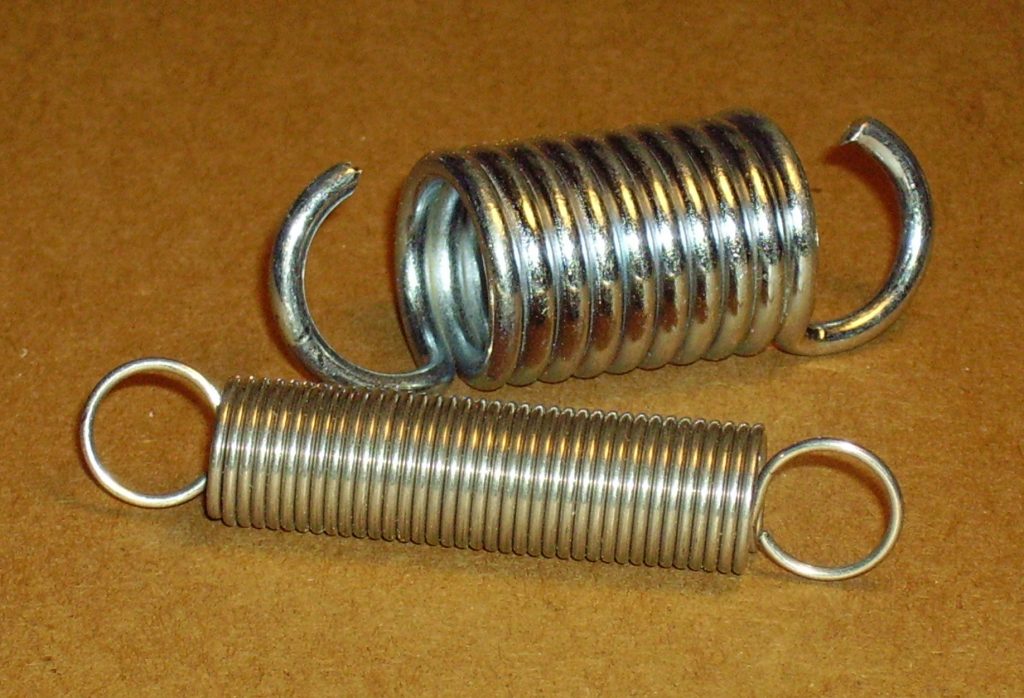 Understanding The Difference Between Torsion And Extension Springs